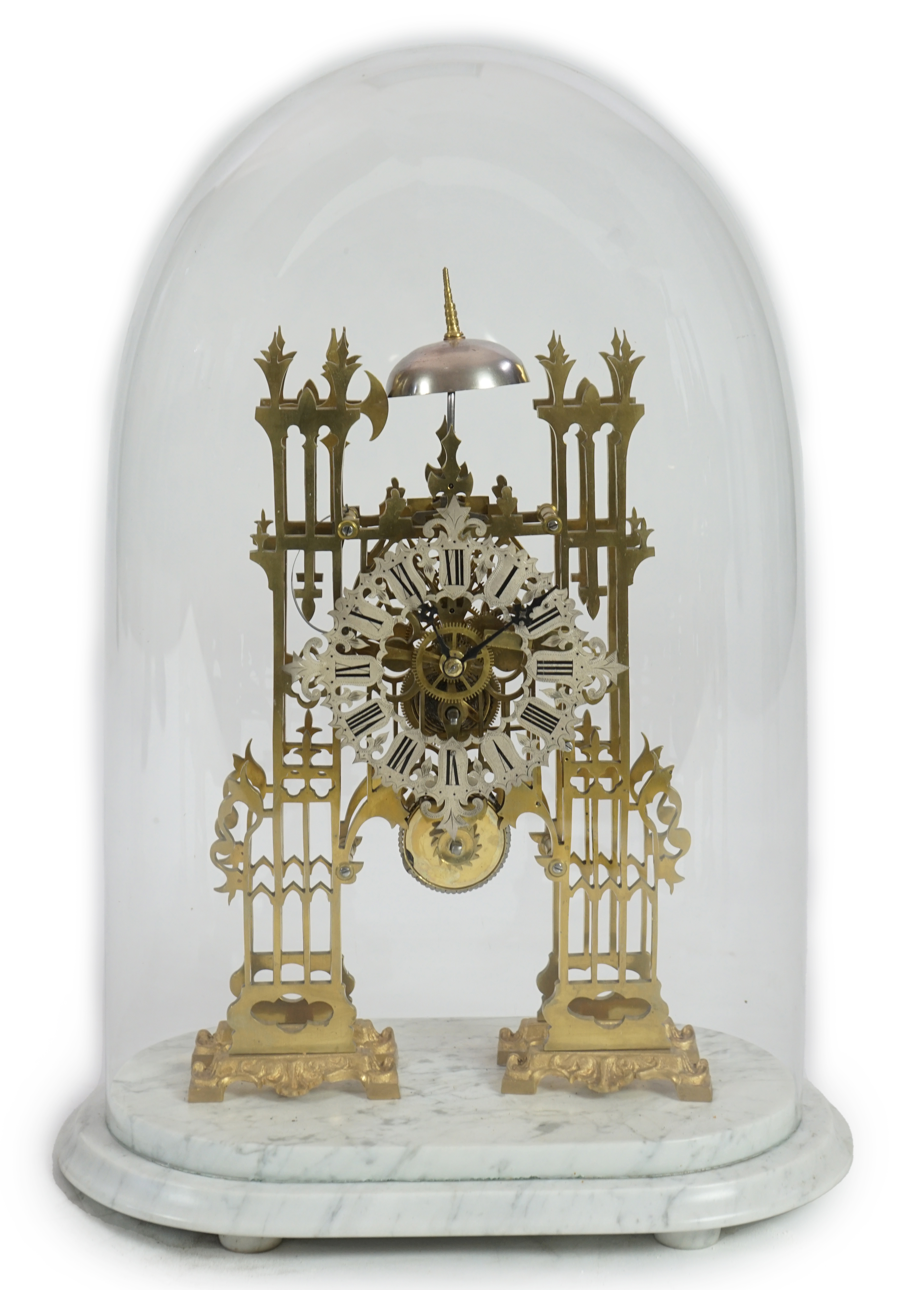 A Victorian brass cathedral front skeleton clock